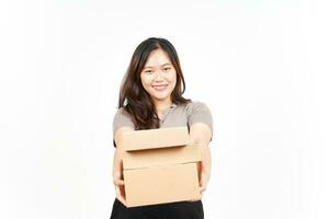 Holding Package Box or Cardboard Box Of Beautiful Asian Woman Isolated On White Background photo