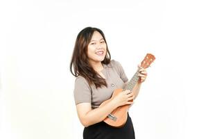 Playing Ukulele Of Beautiful Asian Woman Isolated On White Background photo