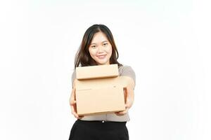 Holding Package Box or Cardboard Box Of Beautiful Asian Woman Isolated On White Background photo