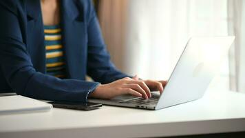 business woman working with digital tablet computer and smart phone with financial business strategy layer effect on desk video