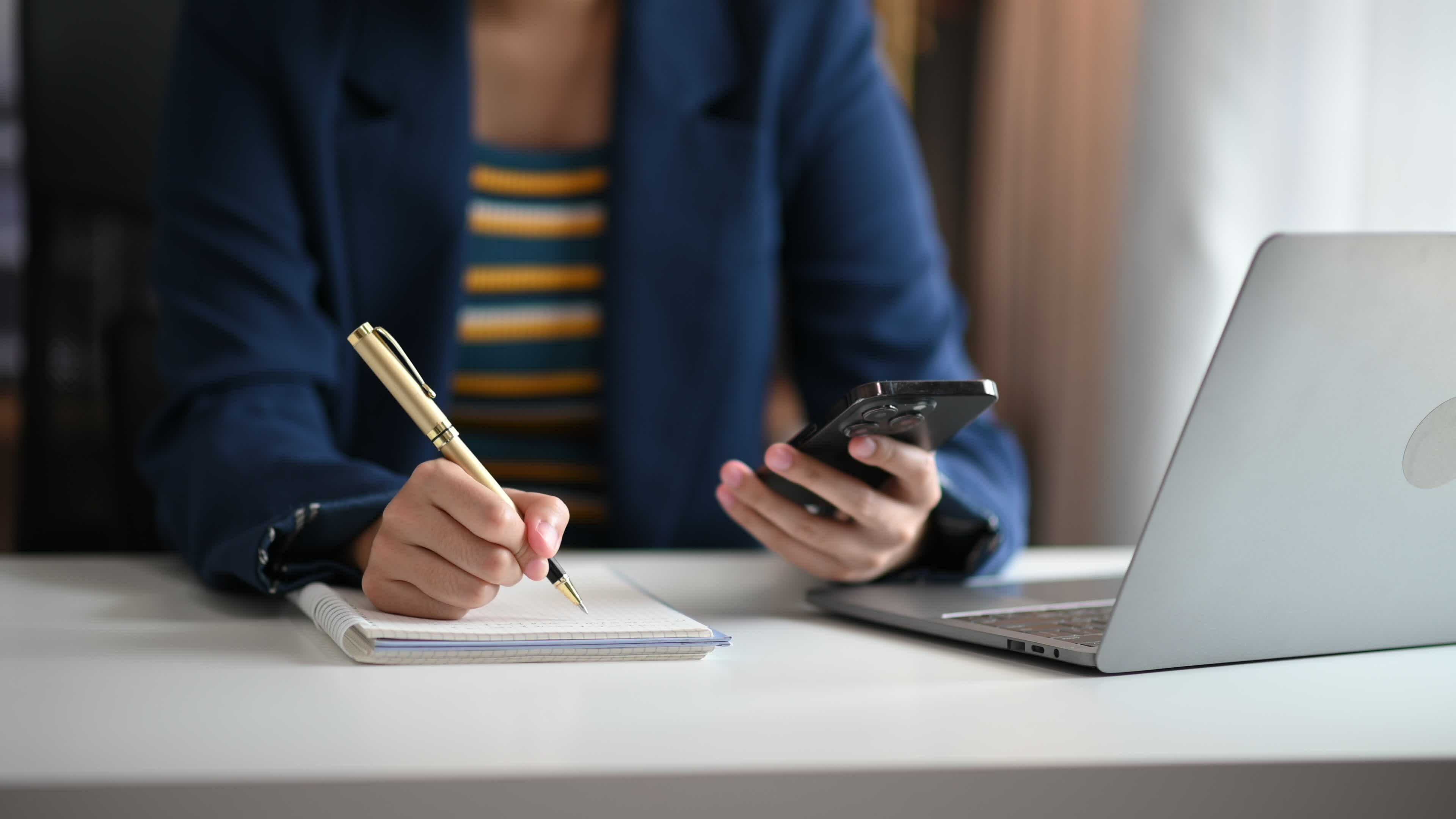business hand working with new modern computer and writing on the