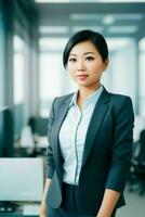 Businesswoman in the middle of a modern office photo