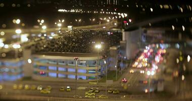Timelapse night shot of car traffic near parking lot video