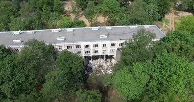 Old apartment block collapse after destructing with excavator video