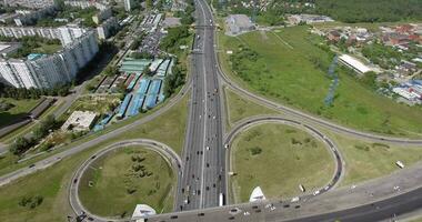 An aerial view of a huge road junction and an industrial urbanscape around it video