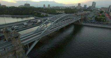 An aerial view of a road bridge and a long highway with busy traffic video