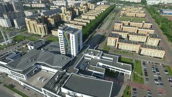 An aerial view of a multi storey residential district on a bright sunny day video