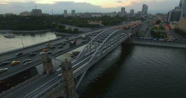 A transport bridge over a city river video