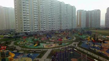 A large and colorful playground in a residential area video