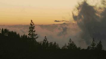 Timelapse of clouds in the mountains at sunset video