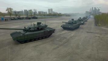 Aerial shot of tanks in columns setting off from military base, Russia video