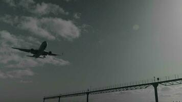 Final approach of jetliner, bottom view video