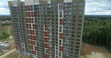 Aerial view of new apartment house built far from the city dust video