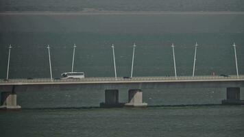 A view to a road bridge over the water video