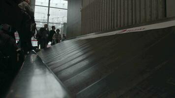 Timelapse shot of people at baggage claim area at the airport, Paris video