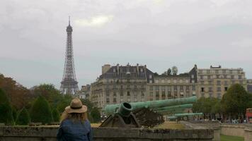 Paris view with Eiffel Tower and old cannons near Les Invalides, France video