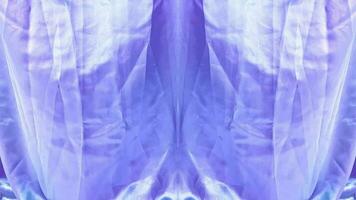 Blue curtain background. Red silk fabric blowing in the wind video