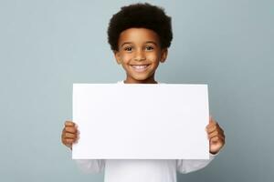 Happy black scholl boy holding blank white banner sign, isolated studio portrait. AI Generated photo