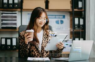 Project manager working and update tasks with milestones progress planning and Gantt chart scheduling diagram. business working with smart phone, tablet and laptop in office. photo