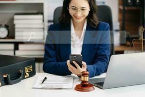 Searching Browsing Internet Data Information Networking Concept with blank search bar.justice and law concept.Male judge in a courtroom with the gavel,working with digital tablet computer. photo