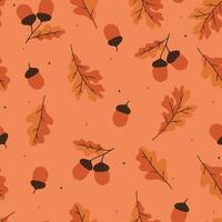 Seamless pattern with autumn oak leaves and acorns on a orange background. Vector graphics.