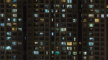 High-rise apartment block at night photo