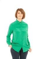 Portrait of adult woman in green blouse looking up photo