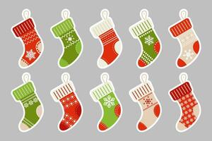 Winter Christmas socks with snowflake ornament, stikcers set. Icons, vector