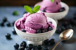 blueberry ice cream on the table with a blurry background photo