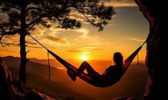 Woman hiker resting after an arduous climb, lounging in a hammock as the sun sets. AI Generated photo