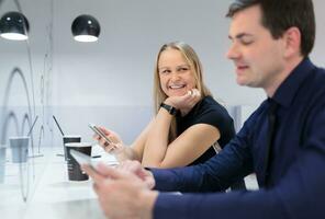 Businessman and woman in a meeting photo