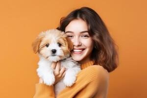 Happy girl with cute little puppy photo