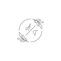 Initials AT monogram wedding logo with simple leaf outline and circle style vector