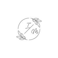 Initials IM monogram wedding logo with simple leaf outline and circle style vector