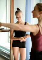 Ballerina looking at the floor photo