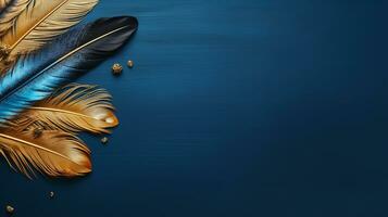 Golden and blue indigenous feather copy space background photo