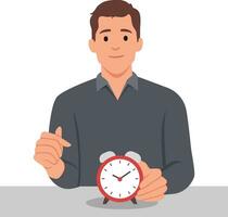 Smiling man points finger at alarm clock to remind of beginning or end of lunch break. Concept time management and control over optimal use of working period. vector