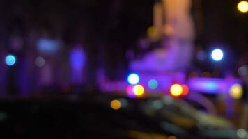 Defocus bokeh of rescue workers with police and ambulance lights video