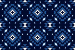 Ethnic ikat geometric seamless pattern. design for carpet, clothing, fabric vector