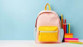 Backpack with bright school stationery on isolate background, banner design. Back to school concept photo