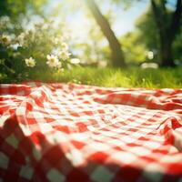 rojo y blanco tartán picnic cobija en parte superior de un verde campo en soleado día en césped de césped en verano parque. borroso antecedentes. generativo ai foto