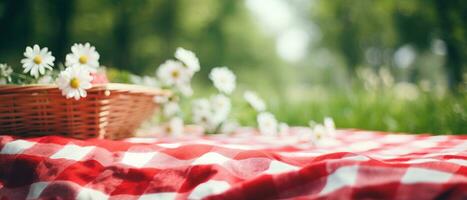 rojo y blanco tartán picnic cobija en parte superior de un verde campo en soleado día en césped de césped en verano parque. borroso antecedentes. generativo ai foto