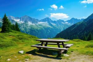 Picnic bench in the mountains photo