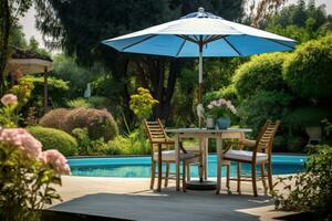 Cafe table with chair and parasol umbrella in the garden photo