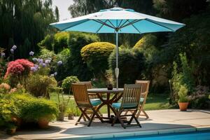 Cafe table with chair and parasol umbrella in the garden photo