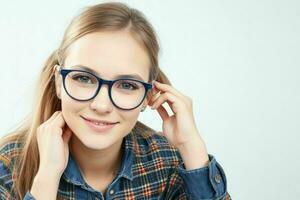 Hipster student woman wearing eyewear glasses photo