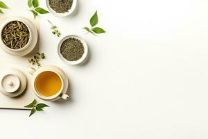 Green tea in a white teapot and cups on white background top view with copy space. Generative AI photo