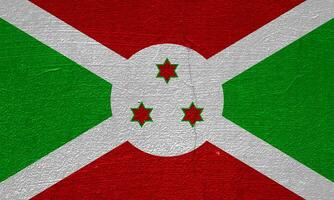 Flag of Republic of Burundi on a textured background. Concept collage. photo