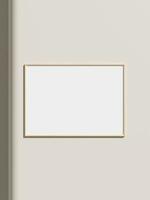 Thin rectangular frame hanging on a white textured wall mockup. photo