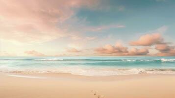 Footprints in the sand on a serene beach photo